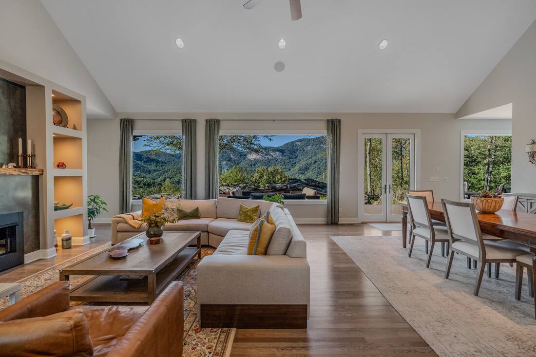Great room, picture windows on the rear view